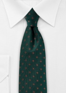 Grüne Krawatte mit kupferfarbenen Elementen