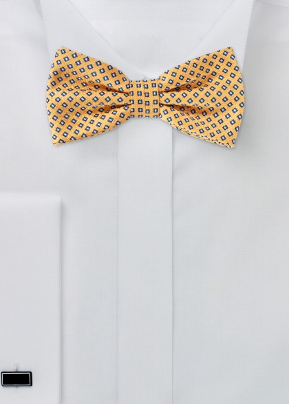 Fliege in Gelb mit Muster in Blau und Weiß